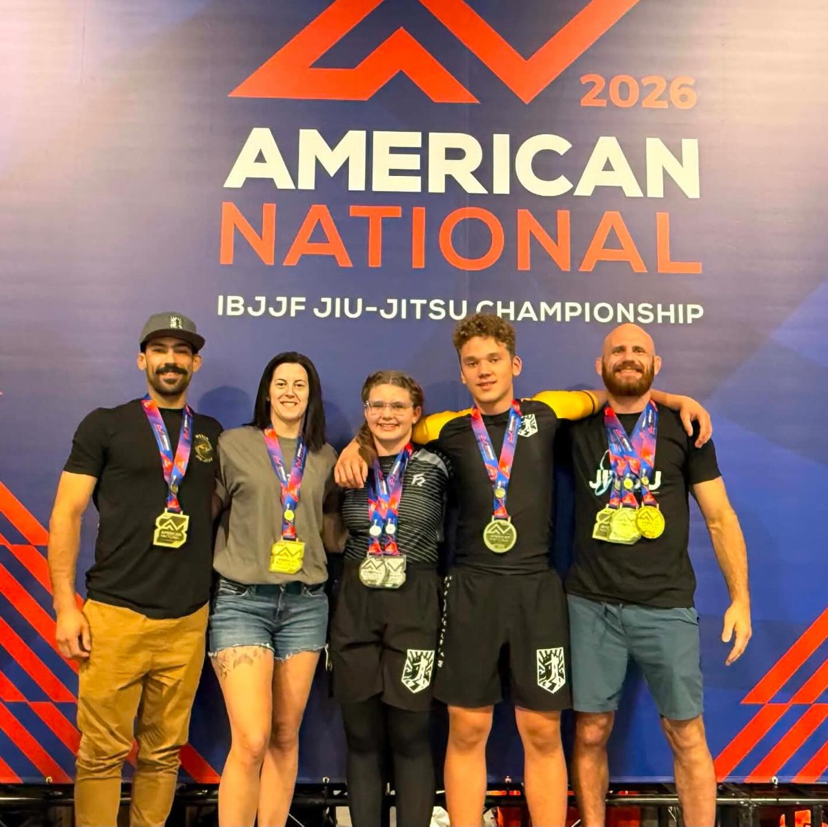 The Fort’s five American Nationals competitors together with their medals