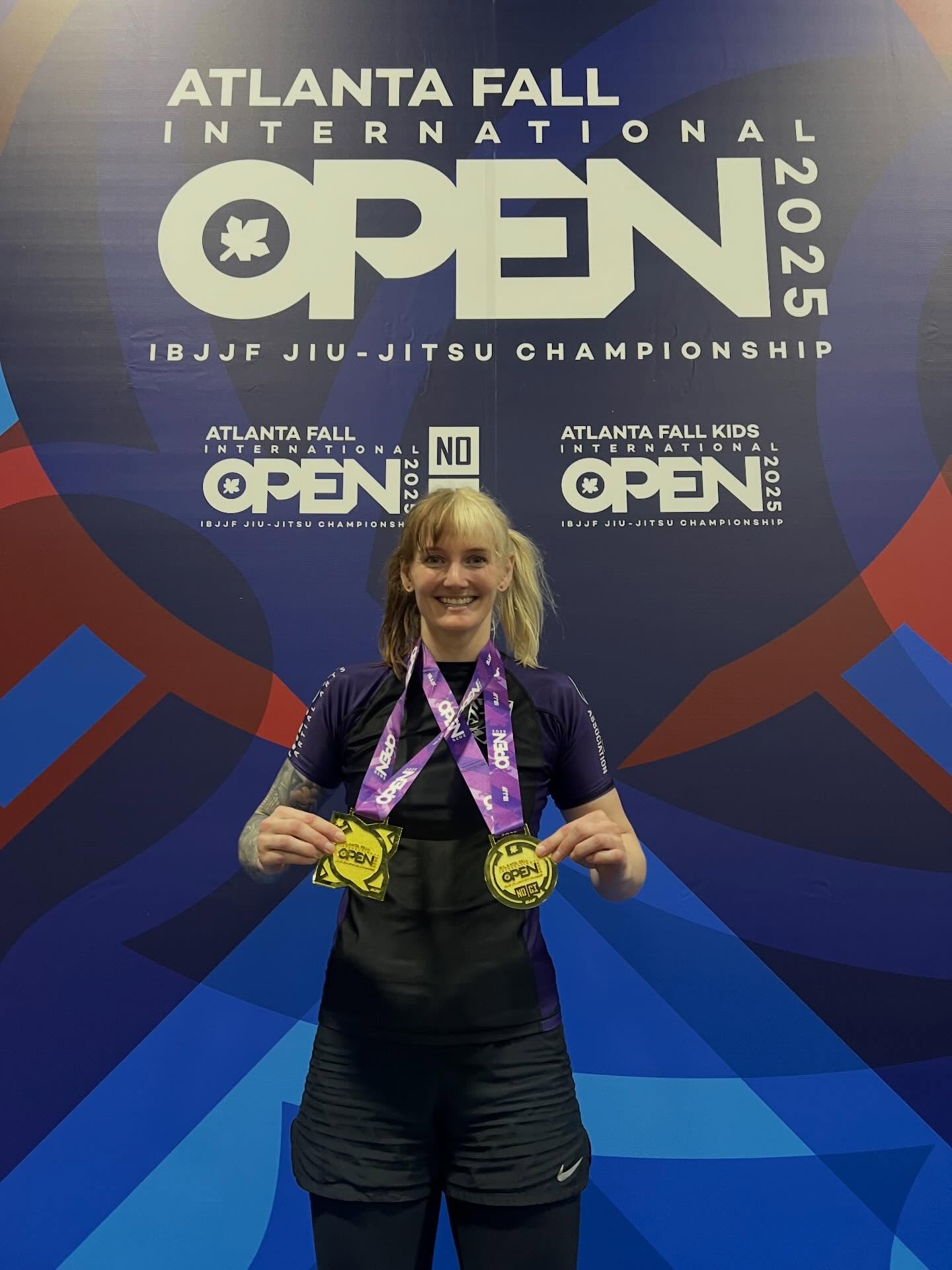 A Fort competitor displaying two gold medals at the 2025 Atlanta Fall International Open