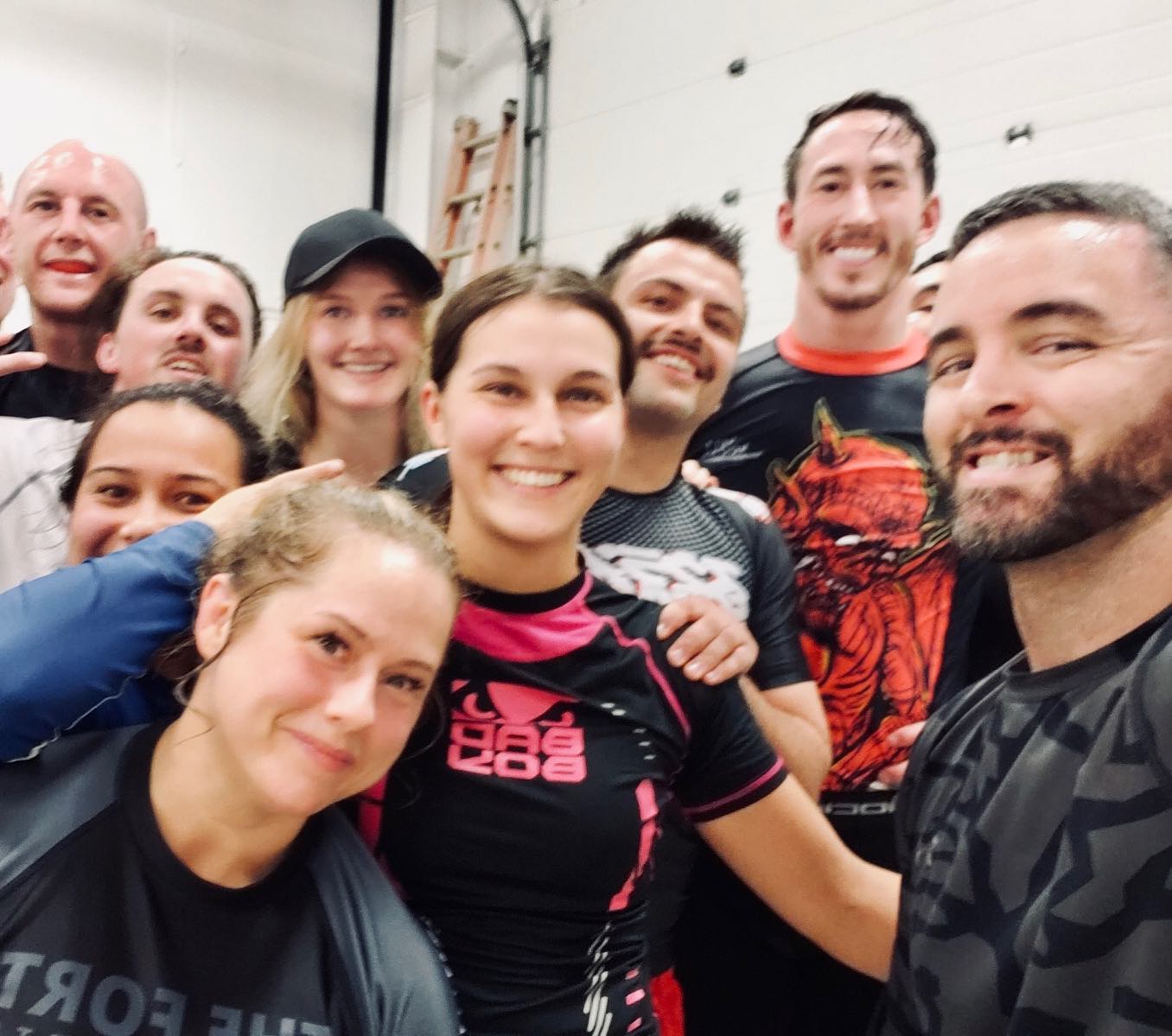Fort members smile together in a group selfie after birthday training.