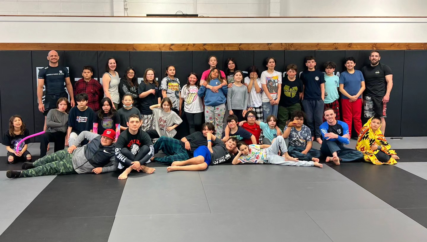Elsie Fabian School students and Fort coaches together on the training mats