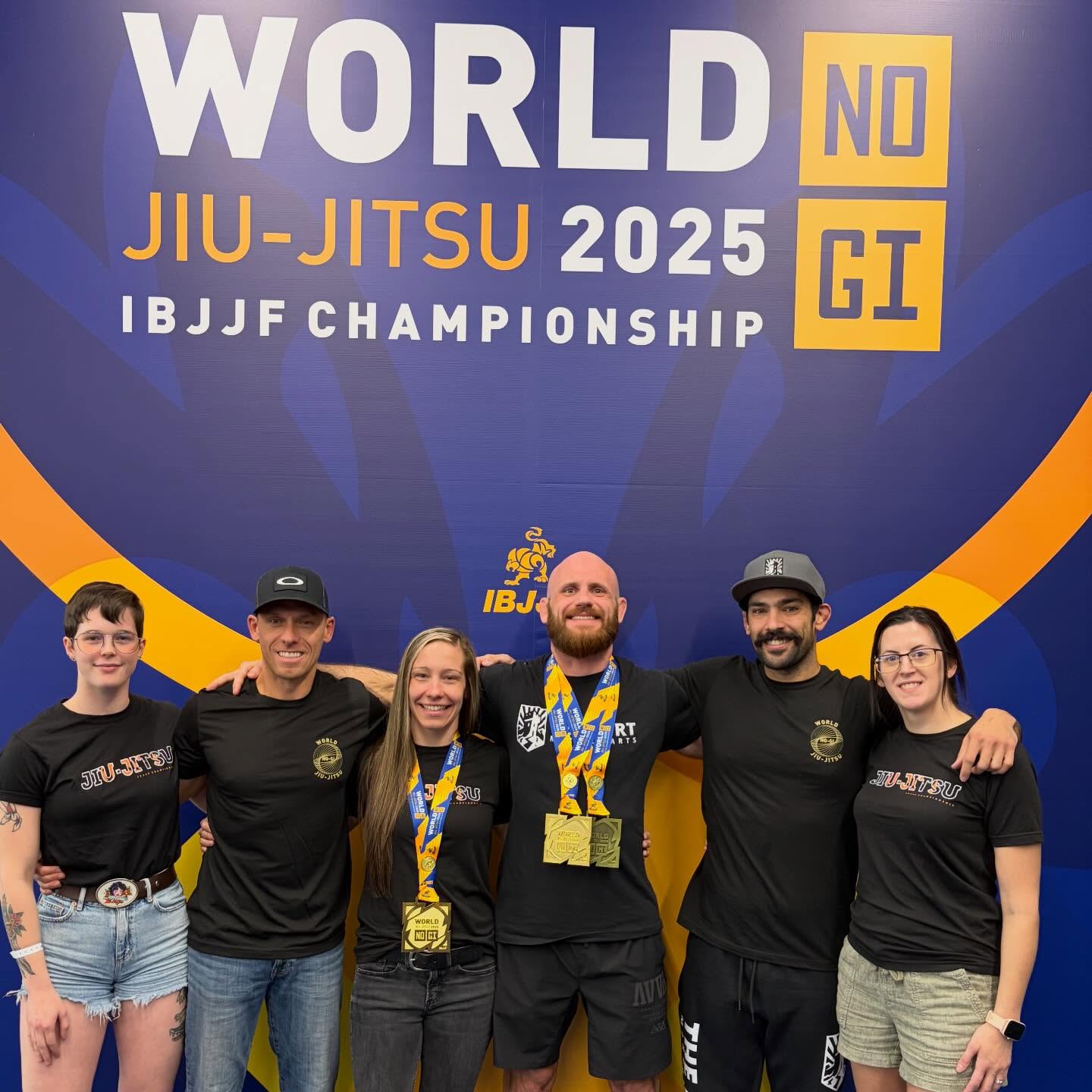 Fort competitors and supporters celebrating with medals at the 2025 No-Gi World Championships